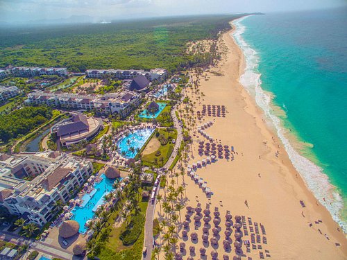 Hard Rock Hotel and Casino Punta Cana all-inclusive resort with large pools, beachfront setting, and entertainment complex.