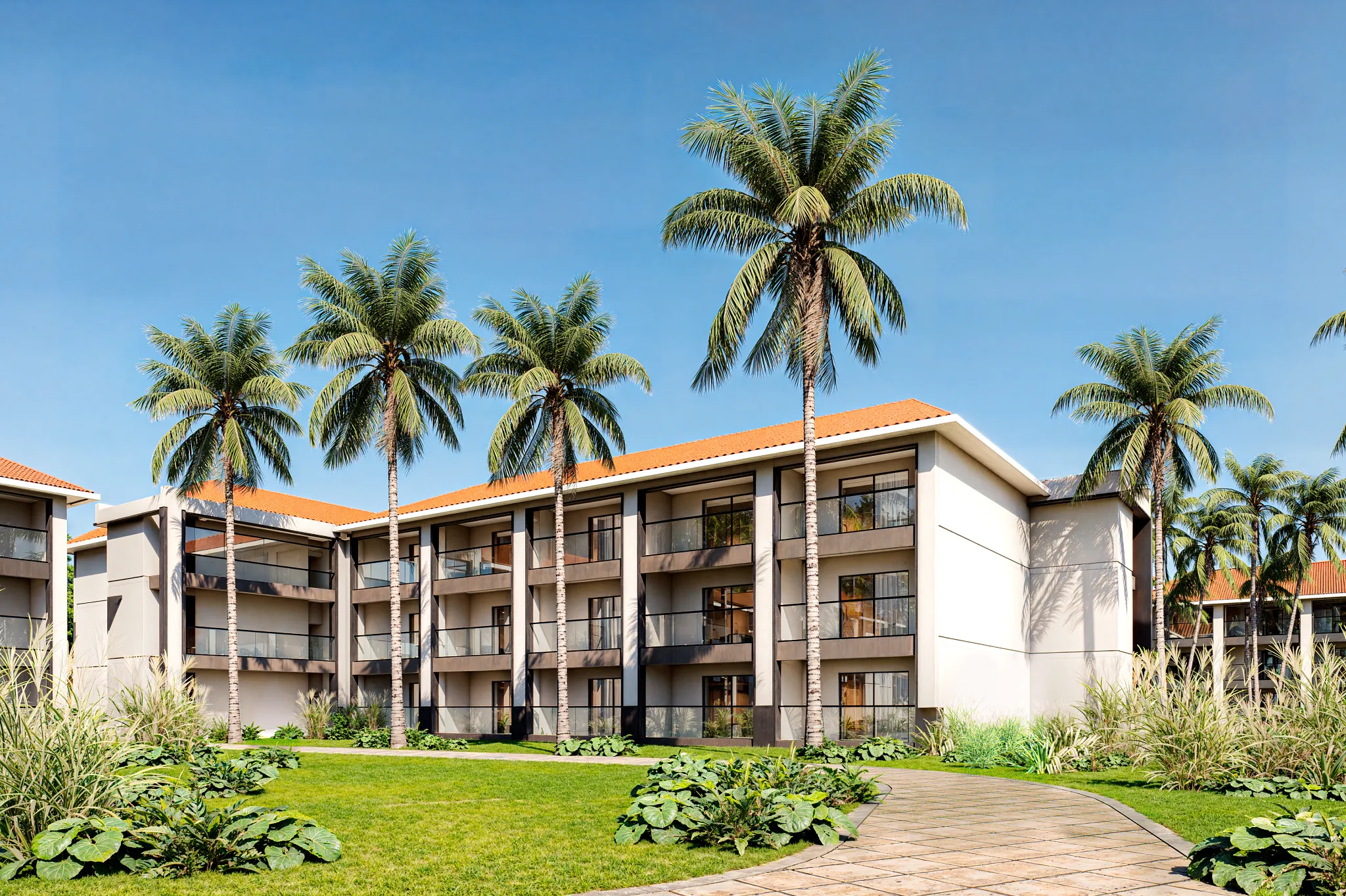 Stylish resort building with balconies and tropical landscaping at Hyatt Vivid Punta Cana.