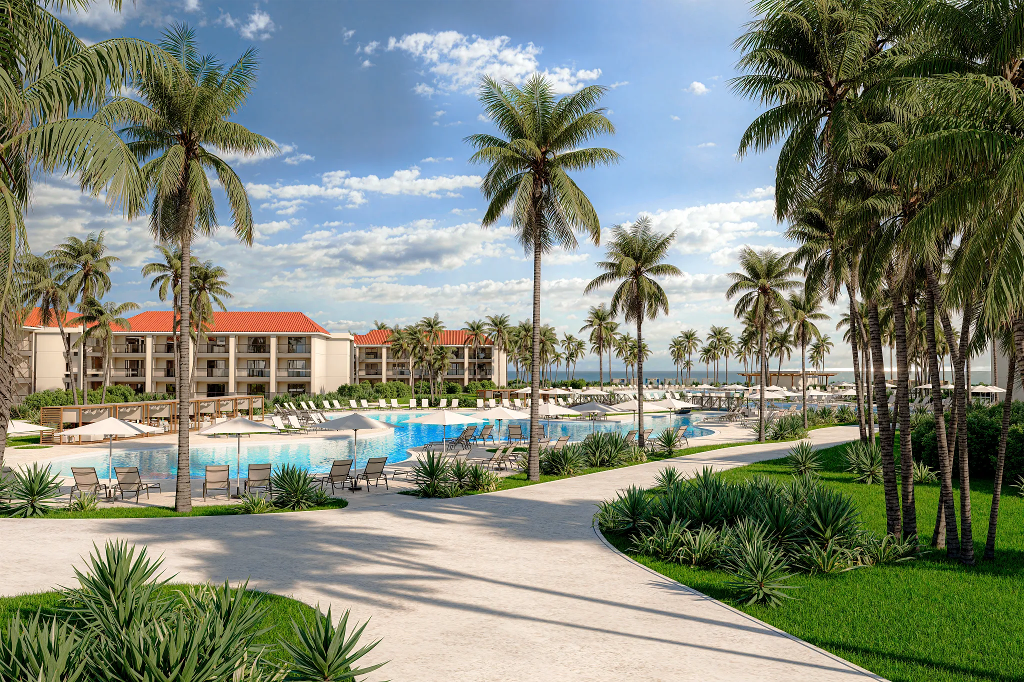 Scenic pool and garden pathways with resort buildings and palm trees at Hyatt Vivid Punta Cana.