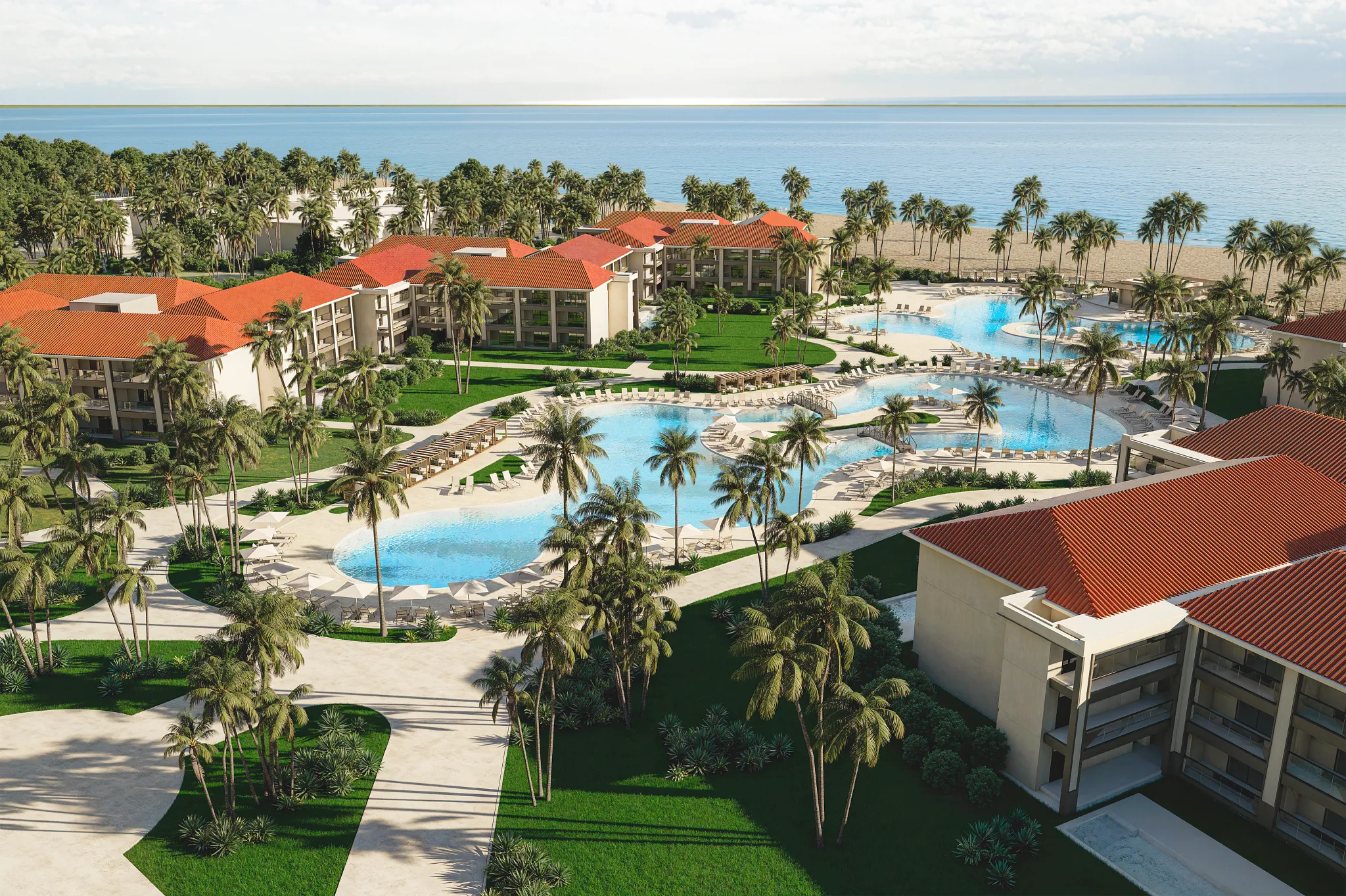 Aerial view of Hyatt Vivid Punta Cana resort pools, tropical gardens, and beachfront location.