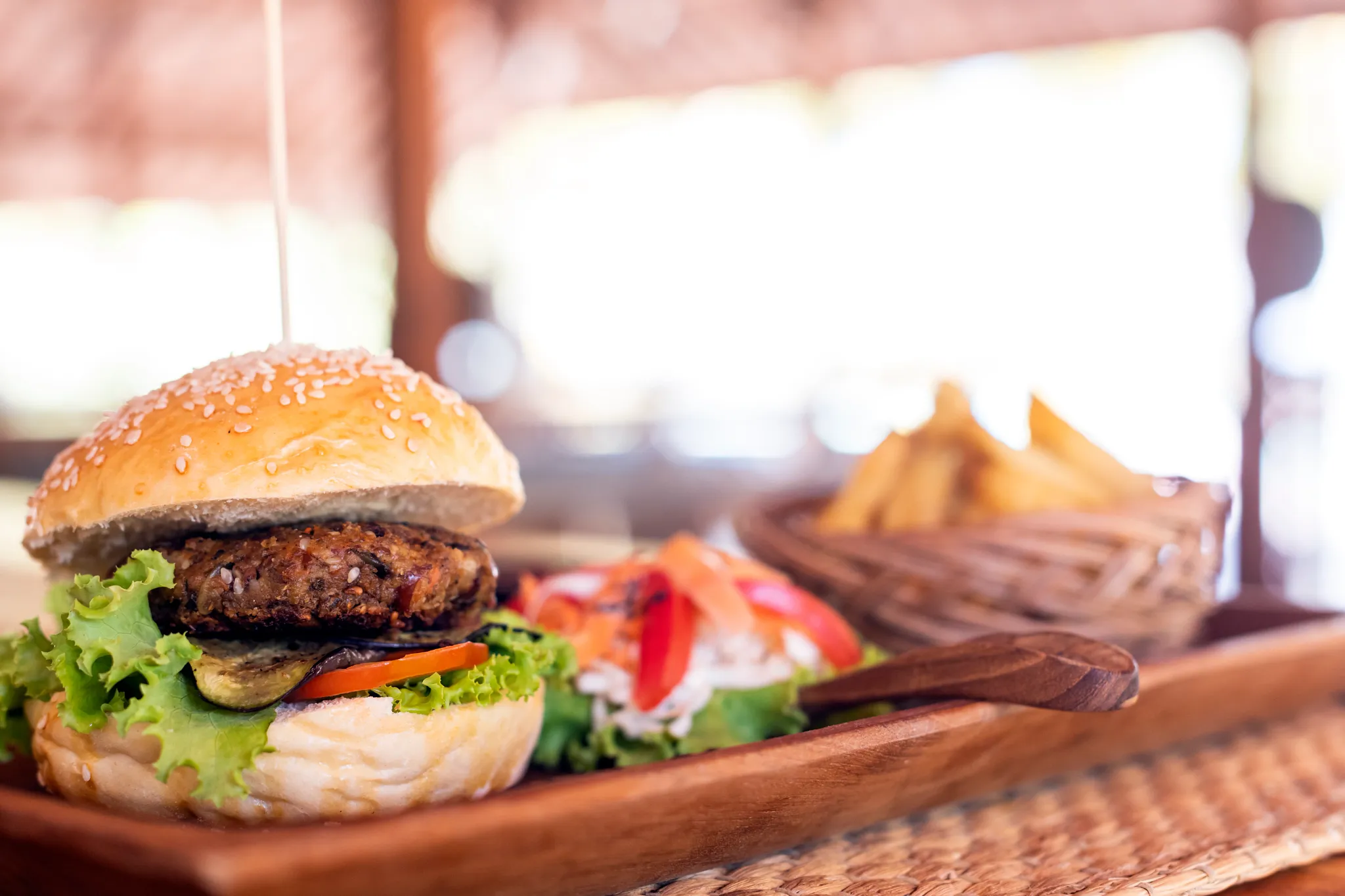 Spirited Sandpiper Bar & Grill at Hyatt Vivid Punta Cana featuring a beachfront dining setting, casual seating, and tropical cocktails by the ocean.