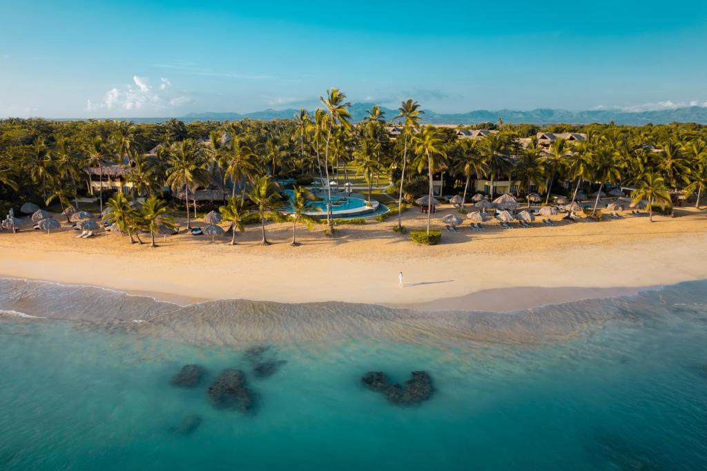Zoetry Agua Punta Cana boutique all-inclusive resort with serene beachfront suites and tropical surroundings.